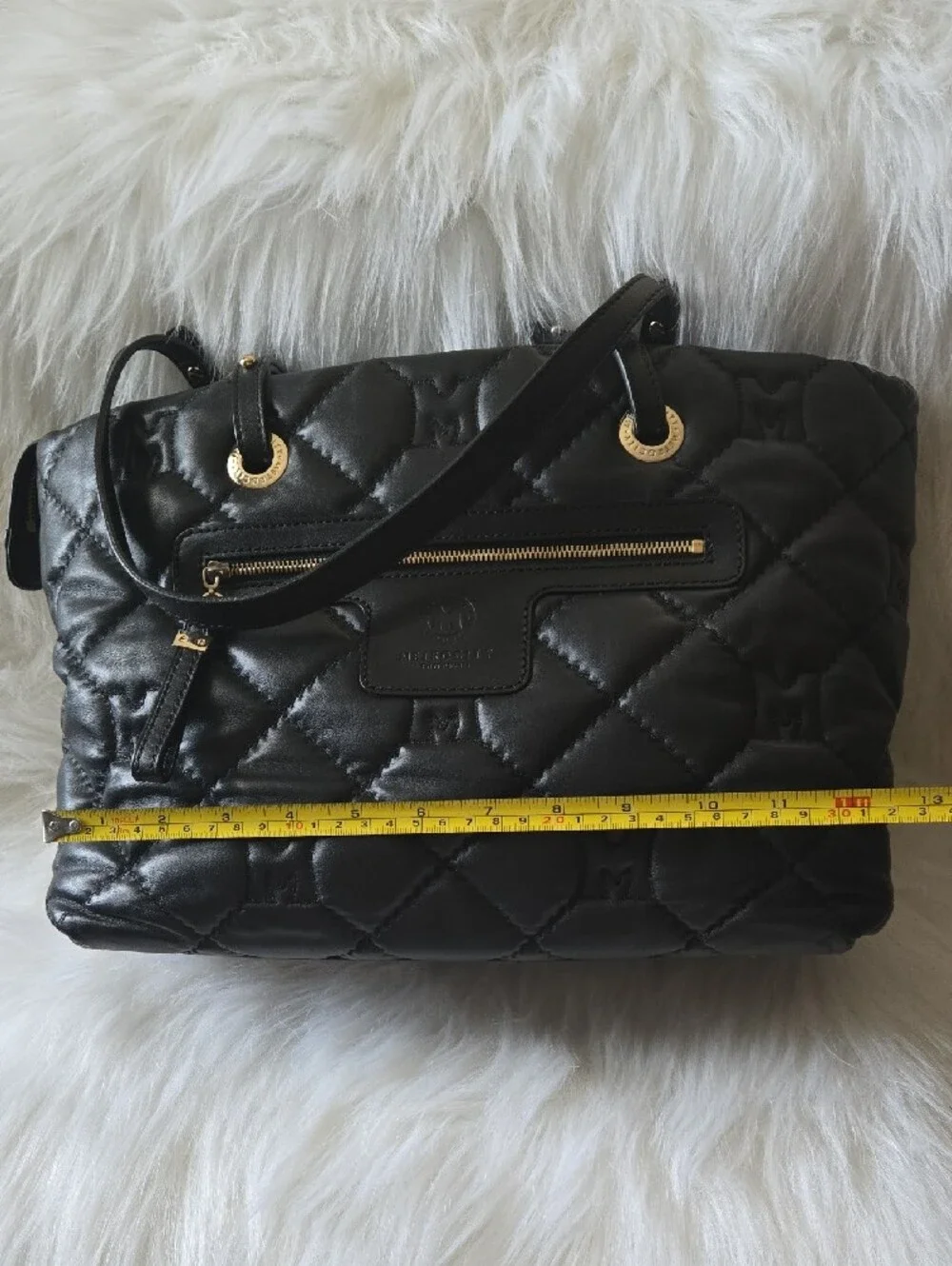 Quilted Black Tote with Gold Medallion Accent